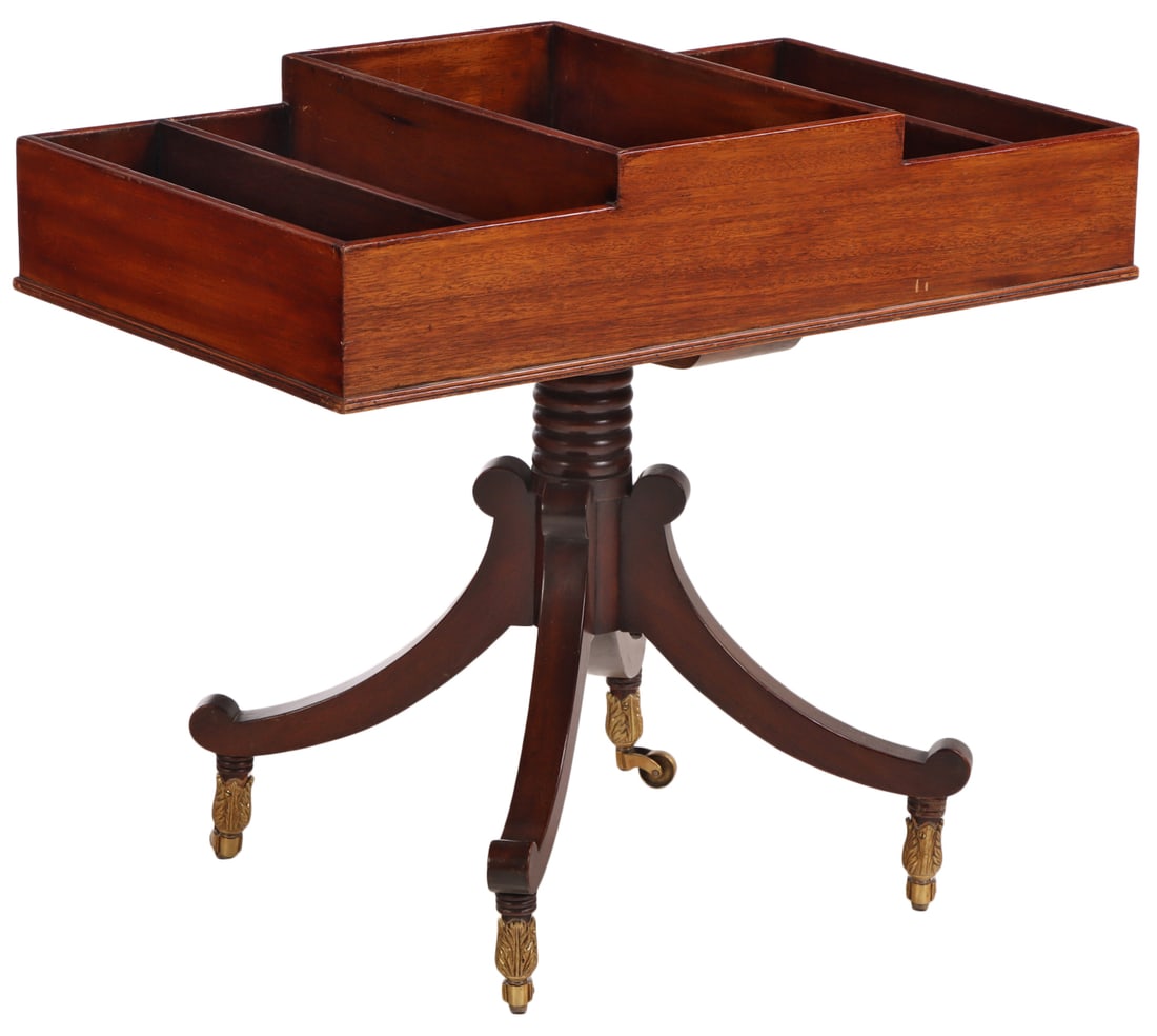 A ANTIQUE MAHOGANY MAGAZINE STAND TABLE IN THE REGENCY STYLE, BRANDED THE COMPANY OF MASTER: A antique mahogany magazine stand table in the Regency style, branded The Company of Master Craftsmen. Ht: 24" Wd: 27" Dpth: 16"