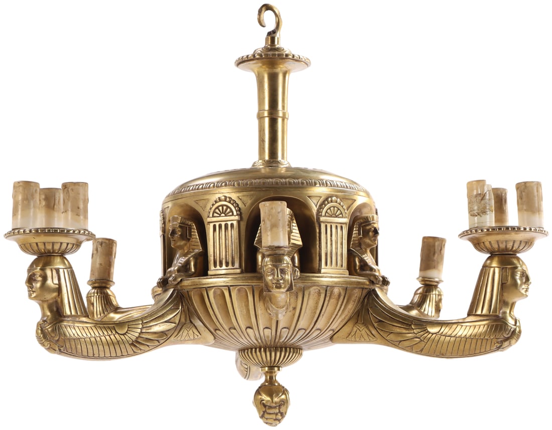 UNUSAL BRONZE SIX ARM CHANDELIER HAVING EGYPTIAN MASKS C 1930.: Unusal bronze six arm chandelier having Egyptian masks C 1930. Ht: 23" Wd: 27" Dpth: 27"