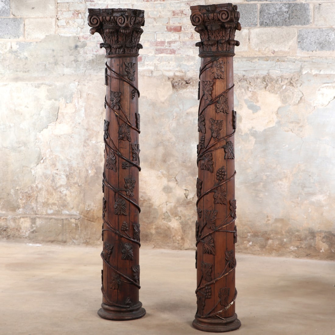 PAIR OF NINETEENTH CENTURY CARVED WOOD COLUMNS WITH CORINTHIAN CAPITALS AND GRAPE LEAF (1 of 7)