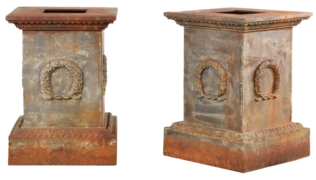 PAIR OF 34" CAST IRON PEDETSALS WITH WREATH DECORATION.: Pair of 34" cast iron pedetsals with wreath decoration. Ht: 34" Wd: 24.5" Dpth: 24.5"