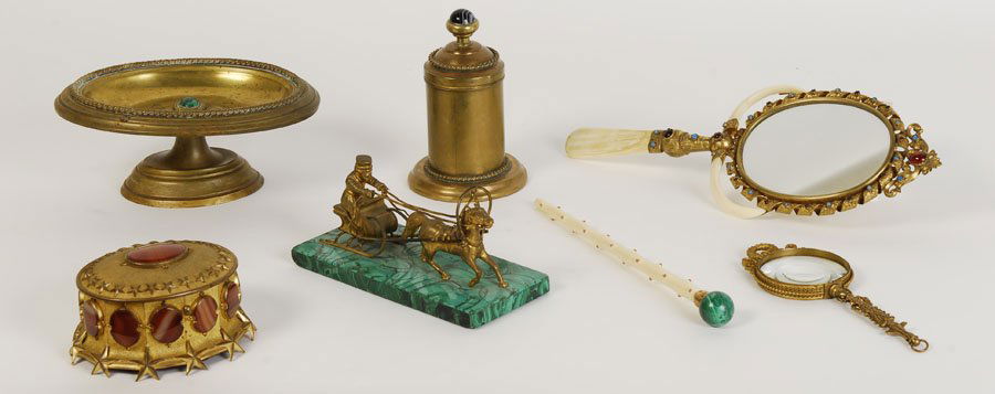 7 PC GEMS BRASS TURQUOISE HAND MIRROR WAND: Fine seven piece gem enhanced brass lot of dresser and desk items featuring a boar tusk turquoise and garnet decorated hand mirror circa 1900. Also to include an ivory, coral and malachite wand. Ht: 1