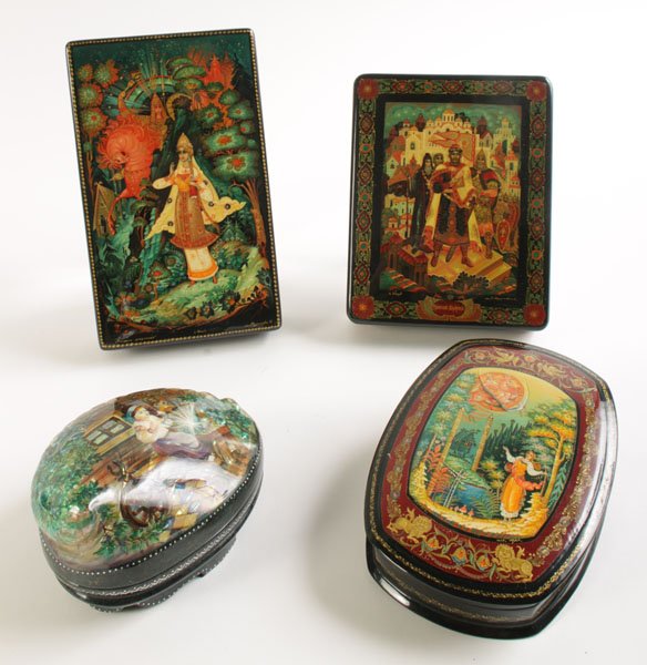 GROUPING OF 4 HANDPAINTED RUSSIAN LACQUER BOXES: A grouping of four hand painted Russian lacquer boxes with folklore themes with one having a shell top circa 2000. Ht: 8" Width: 4" Depth: 1" (largest)