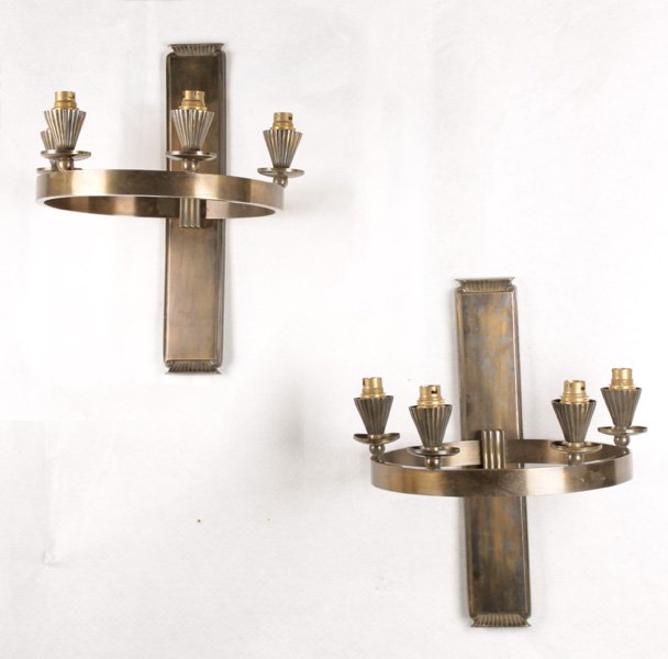ART DECO STYLE BRONZE SCONCES 4 LIGHTS: A pair of Art Deco style bronze sconces having stylized backplates with ring form arm supporting four lights. Ht: 17.5" Width: 14" Depth: 13"