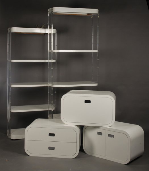 MODERN JAMES BOND STYLE LUCITE WALL UNIT: A mid century modern James Bond style lucite and lacquered modular wall unit having multiple cabinets and shelves circa 1970. Ht: 80.5" Width: 103" Depth: 17.5"