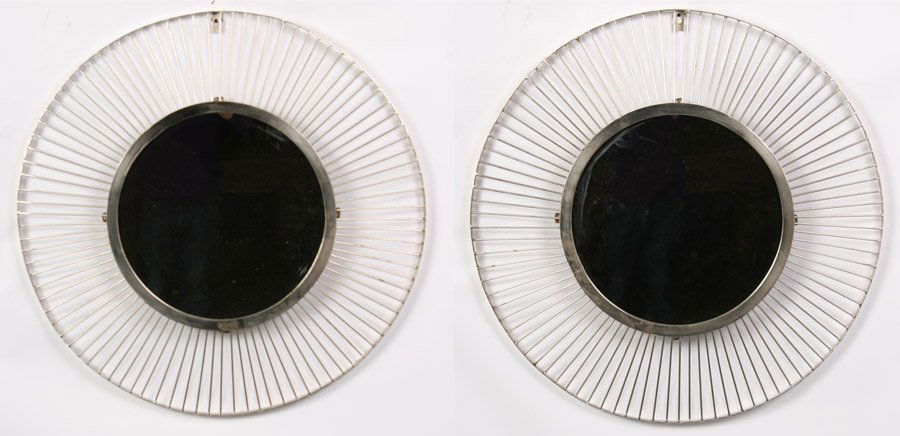 PAIR POLISHED WROUGHT IRON SUNBURST MIRRORS: A pair of polished wrought iron sunburst mirrors. Dia: 36"
