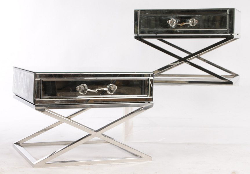 PAIR OF MIRRORED SIDE TABLE WITH X-FORM BASE: Pair of mirrored side tables having a single drawer with bridle style pull supported on chrome X-form base. Ht: 18" Width: 23.5" Depth: 23.5"