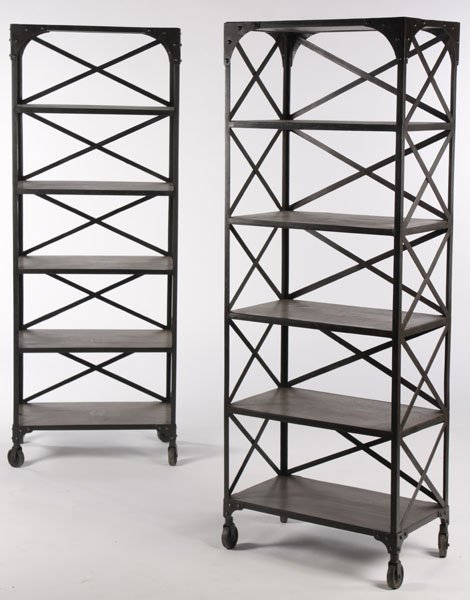 PR INDUSTRIAL ETEGERES INSET WOOD SHELVES: A pair of industrial etegeres having inset wood shelves and x-form sides, raised on casters. Ht: 65" Width: 24" Depth: 14"