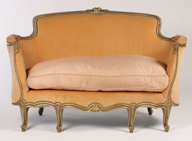 LOUIS XV GILTWOOD PAINTED SETTEE: A good Louis XV style giltwood and painted settee having central floral cartouche and continuous arms over shaped seat circa 1920. Raised on six cabriole legs with scrolling feet. Ensuite with the fol