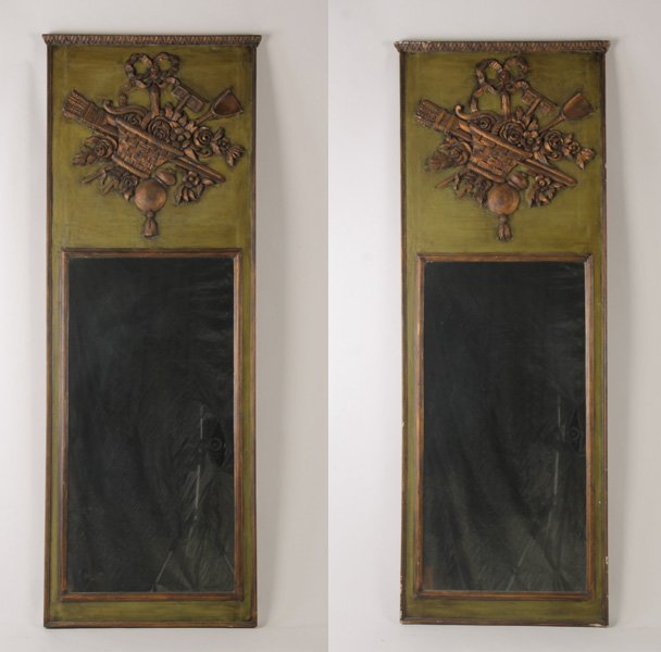 PR PAINTED TRUMEAU MIRRORS FRENCH TASTE: A pair of painted trumeau mirrors in the French taste having decorative panels over mirrored panel circa 1960. Ht: 61" Width: 23"