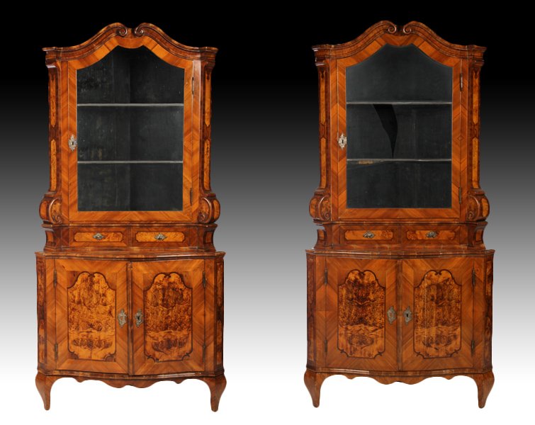 PR 19TH C. INLAID CORNER CABINETS DUTCH GERMAN: A good pair of early nineteenth century two part inlaid corner cabinets possibly Dutch or German. Having broken arch cornice over a glass door framed by burl inlaid corner pilasters sitting on serpent