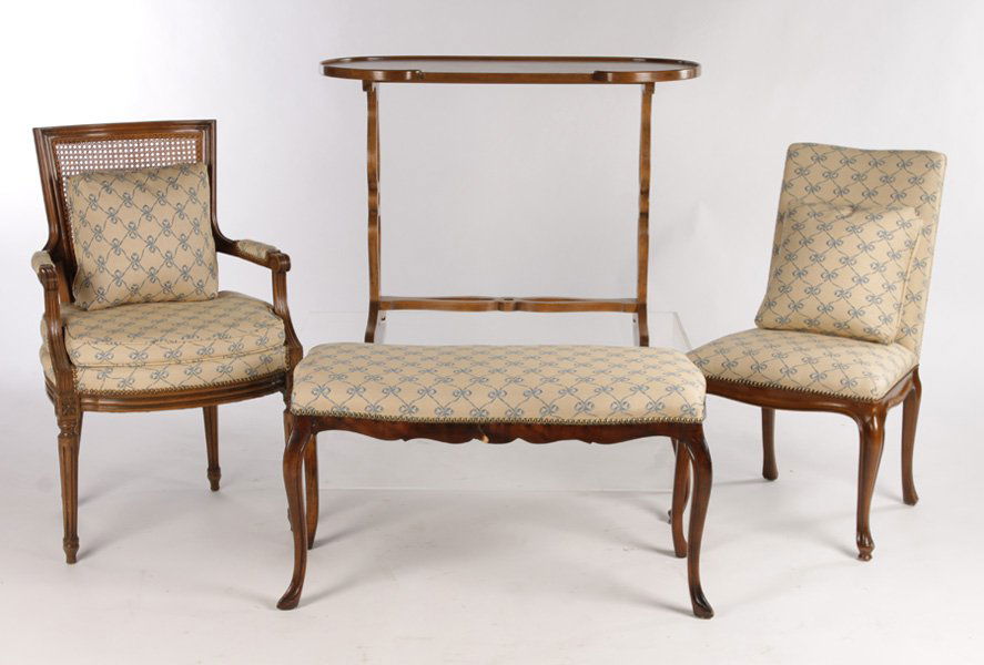 4 PC LOT FRENCH FURNITURE TABLE BENCH CHAIR: Four piece lot of French style furniture including a dressing table, low bench, arm chair and side chair. All upholstered in similar fabric. Ht: 37.5" Width: 23" Depth: 17" (Largest)