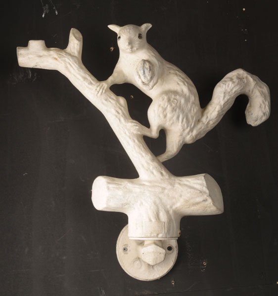 CAST ZINC SQUIRREL DECORATED LIGHTING SUPPORT: An interesting and unusual cast zinc squirrel decorated hall mounted lighting support. Ht: 18.5" Depth: 19"