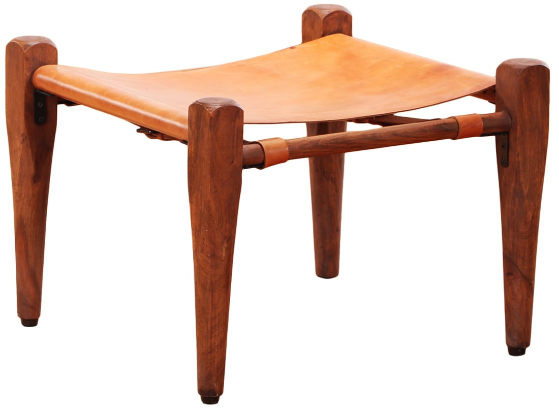 A LEATHER AND WOOD SAFARI STYLE FOOT STOOL IN THE STYLE OF THE DESIGN BY ESBEN KLINT AND PRODUCED BY (1 of 6)
