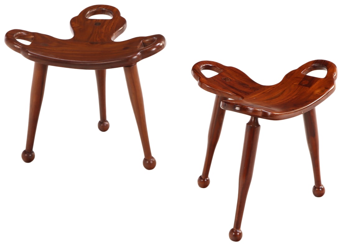 PAIR OF BRAZILIAN MAHOGANY THREE LEG STOOLS WITH INTEGRAL HANDLES. (1 of 4)