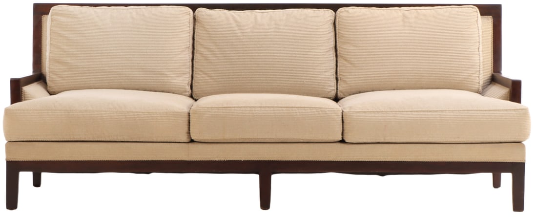 WOOD AND UPHOLSTERED "CAPETOWN" SOFA BY CHRISTIAN LIAIGRE. (1 of 7)