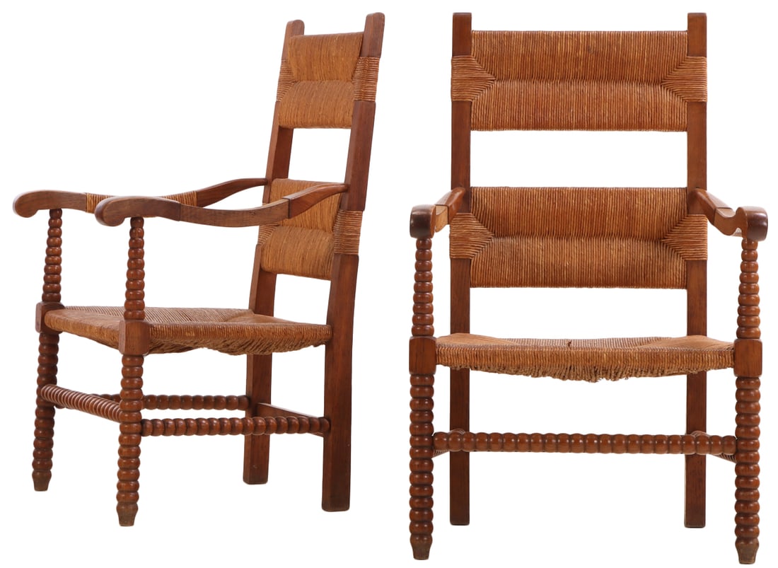 PAIR OF FRENCH OAK AND RUSH BRUTALIST ARM CHAIRS HAVING ELEGANT TURNED SUPPORTS C 1945. (1 of 6)