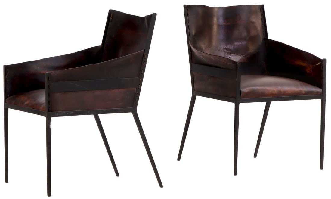 PAIR OF IRON AND LEATHER ARM CHAIRS IN THE MANNER OF JEAN-MICHEL FRANK.: Pair of iron and leather arm chairs in the manner of Jean-Michel Frank. Ht: 36" Wd: 23.75" Dpth: 24.5" Seat: 21"