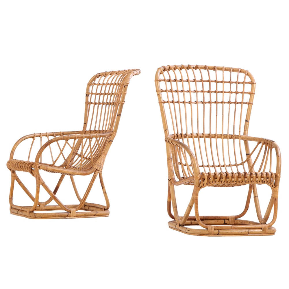 A PAIR OF RATTAN LOUNGE CHAIRS ATTRIBUTED TO TITO AGNOLI. (1 of 8)