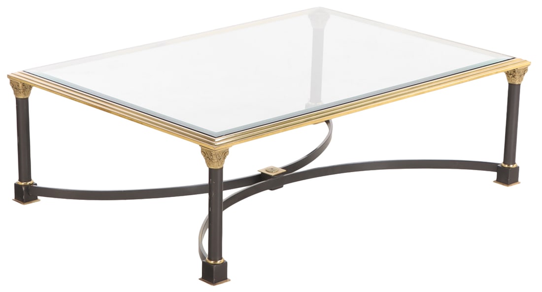 A LARGE TWO TONE BRASS AND GLASS COFFEE TABLE WITH SHAPED STRETCHER C 1965.: A large two tone brass and glass coffee table with shaped stretcher C 1965. Ht: 16" Wd: 51.25" Dpth: 35.5"