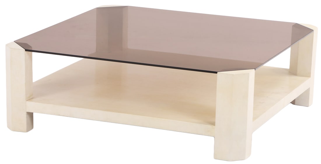 LARGE PARCHMENT COVERED COFFEE TABLE HAVING A SMOKED GLASS TOP C 1970. (1 of 6)