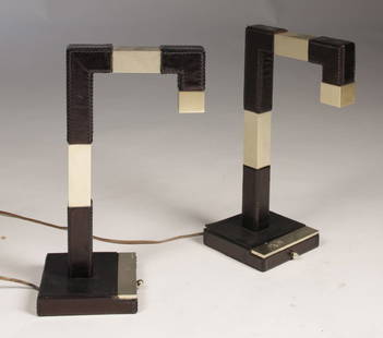 PAIR DECO STYLE BRUSHED STEEL/LEATHER DESK LAMPS: Pair of sleek Deco style brushed steel and Leather desk lamps signed "Le tanneur", made in France, circa 1950. Ht: 16" Width: 6" Depth: 10.25"