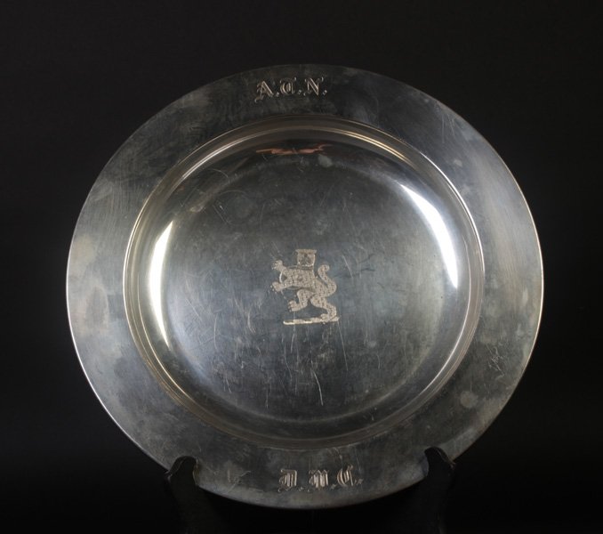 AMERICAN STERLING SILVER CHARGER 25.30 TROY OZ: Handsome American sterling silver charger marked "By John Coburn Boston 1725-1803" Reproduction, circa 1950. 25.30 troy ounces of weighable silver. Engraved with a fraternal organization rampant leopa