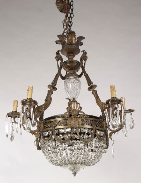 BRONZE CRYSTAL FRENCH CHANDELIER 4 SWANS 2 ARMS: A very good bronze and crystal French Empire style chandelier having four stylized swans circa 1900. Each flanked by two arms terminating in a basket form of crystal. Ht: 38" Width: 30"