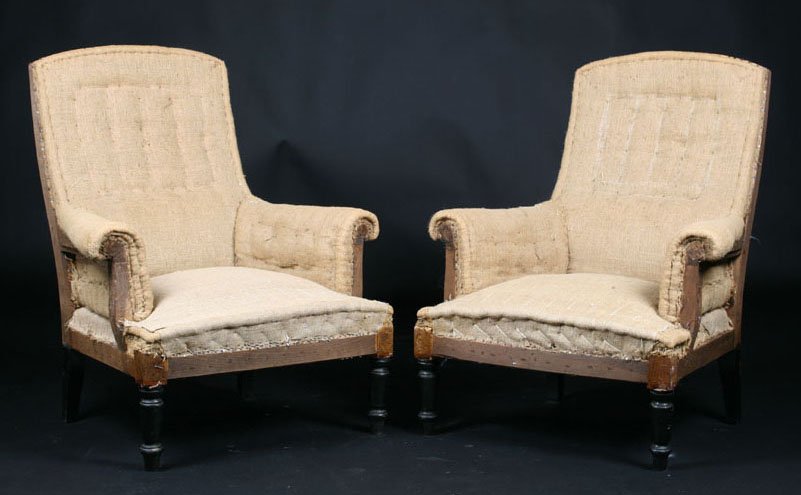 PAIR OF FRENCH NAPOLEON III BERGERES CIRCA 1900: A pair of French Napoleon III bergeres having upholstered backs and rolled arms raised on turned feet, circa 1900. Ht: 37" Width: 29" Depth: 25"