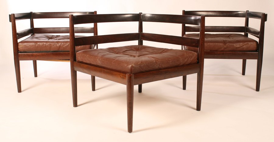 3 RARE DANISH MODERN ROSEWOOD CHAIRS CIRCA 1960: Three rare Danish modern rosewood chairs with curved backs and leather cushions, circa 1960. Ensuite with the following two lots. Ht: 24.5" Width: 28" Depth: 28"