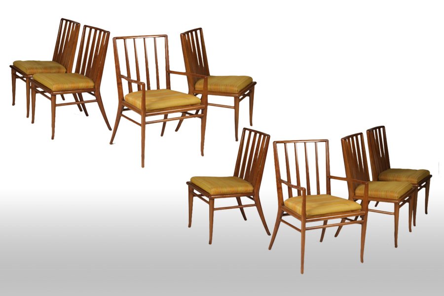 SET OF 8 ROBSJOHN GIBBINGS STYLIZED DINING CHAIRS: Good set of eight twentieth Century Robsjohn Gibbings dining chairs having stylized spindle backs over upholstered seats atop turned legs. Consisting of two arms and six sides. Ht: 34" Width: 22" Dept