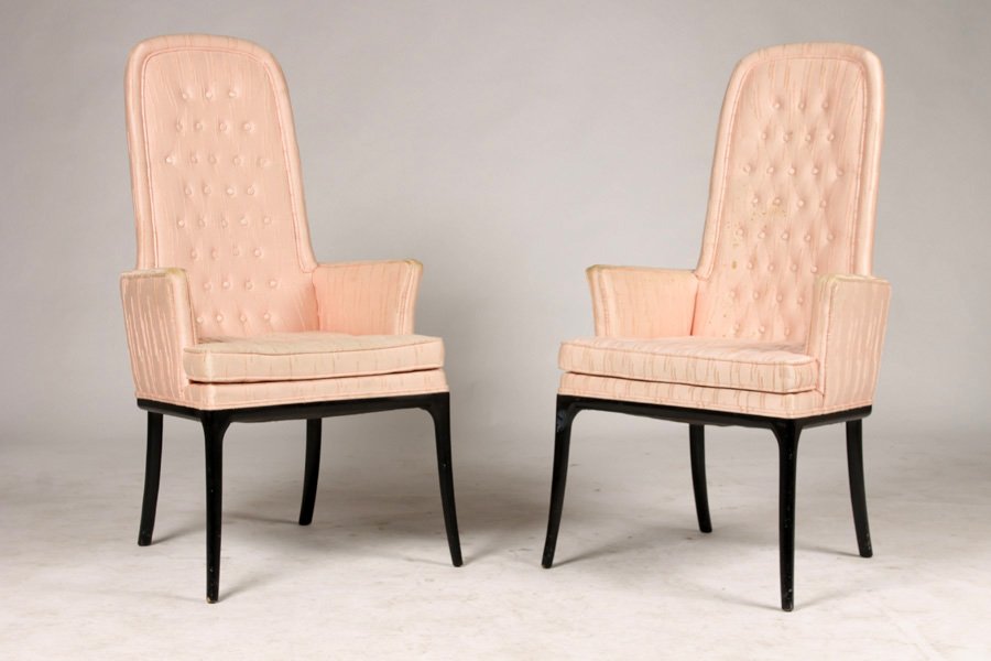 PAIR OF TOMMI PARZINGER STYLE UPHOLSTERED CHAIRS: A pair of Tommi Parzinger style upholstered chairs having arched backs and low arms supported on turned legs, circa 1970. Ht: 45" Width: 22" Depth: 23"