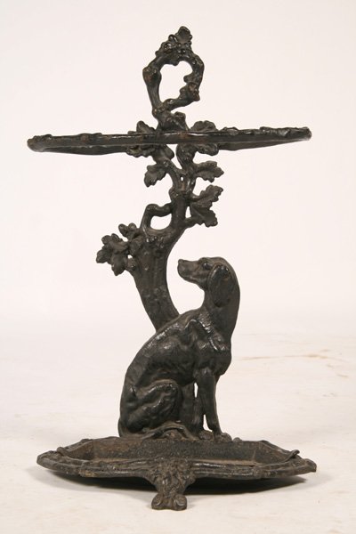 RARE AMERICAN VICTORIAN CAST IRON UMBRELLA STAND: Rare American Victorian cast iron dog form umbrella stand with removable drip pan. Ht: 27.5" Width: 17" Depth: 13"