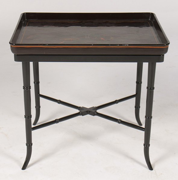 LACQUERED CHINOISERIE TRAY TOP SIDE TABLE: A lacquered and chinoiserie decorated tray top side table with ebonized faux bamboo base having x-form stretcher. Ht: 22" Width: 23.5" Depth: 18.5"