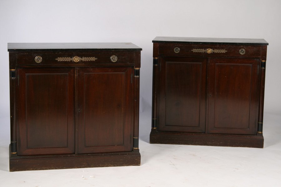 PAIR OF LABELED KITTINGER FRENCH EMPIRE SERVERS: A pair of twentieth Century labeled Kittinger French Empire servers. Each having ebonized tops over single bronze mounted drawer above two doors flanked by turned columns. Ht: 37" Width: 40" Depth: 18
