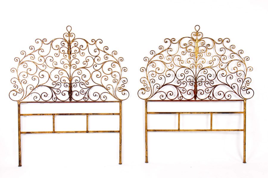 PR TWIN SIZE SPANISH WROUGHT IRON HEADBOARDS: A pair of twin size Spanish style wrought and gilt iron headboards. Ht: 53" Width: 44.5"