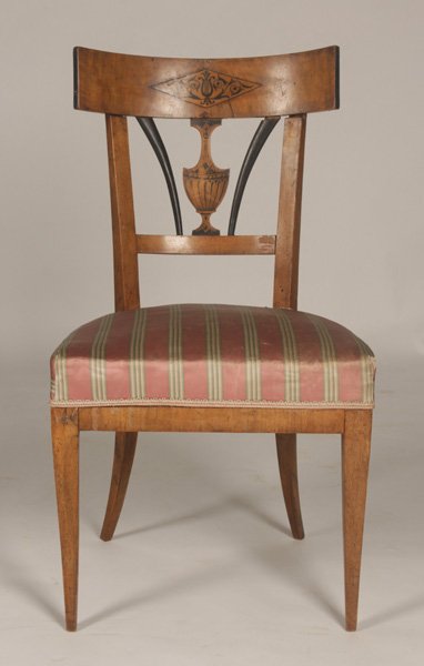 BIEDERMEIER NEOCLASSICAL SIDE CHAIR CIRCA 1820: A good Biedermeier Neoclassical side chair having pen work and ebonized inlaid curved crest rail over run splat and upholstered seat circa 1820. Supported on downswept legs. Ht: 33.5" Width: 19" Depth