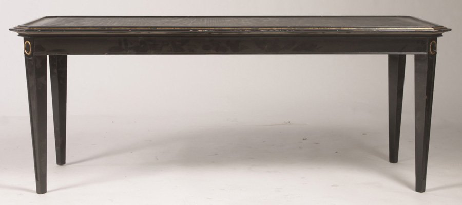 REGENCY STYLE EBONIZED GILT COFFEE TABLE - NO TOP: A twentieth Century Regency style ebonized and gilt decorated coffee table with molded and tapered legs. Lacking mirrored top. Ht: 17" Width: 43.25" Depth: 19.5"