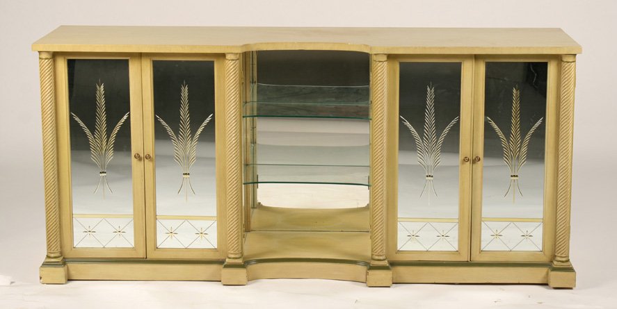 GROSFELD HOUSE STYLE PAINTED SIDEBOARD CIRCA 1960: Grosfeld House style painted sideboard having four doors with etched decorated mirrored fronts flanked by twist carved columns all raised on plinth base circa 1960. Ht: 32" Width: 70" Depth: 18"