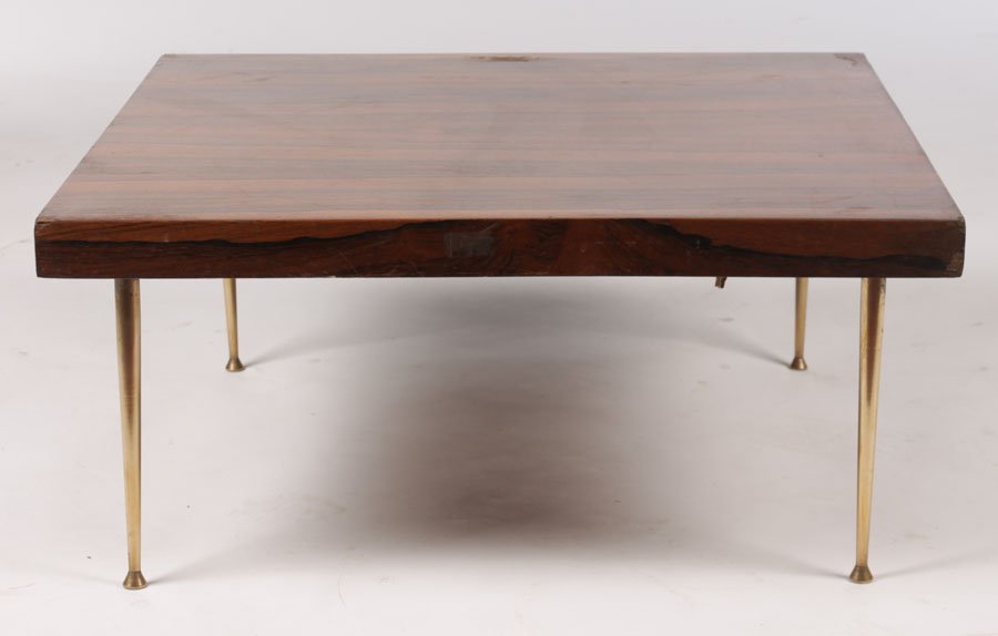MODERN ROSEWOOD SIDE TABLE BRASS LEGS: A mid century modern rosewood side table with brass legs circa 1960. Ht: 12" Width: 27" Depth: 27"