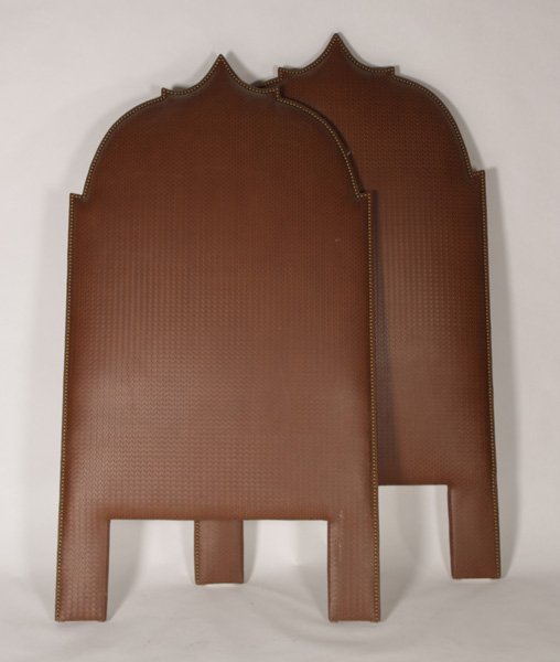 PR UPHOLSTERED HEAD BOARDS PAGODA NAIL HEAD: A pair of upholstered head boards having Pagoda form top and nail head decoration. Ht: 74" Width: 40"