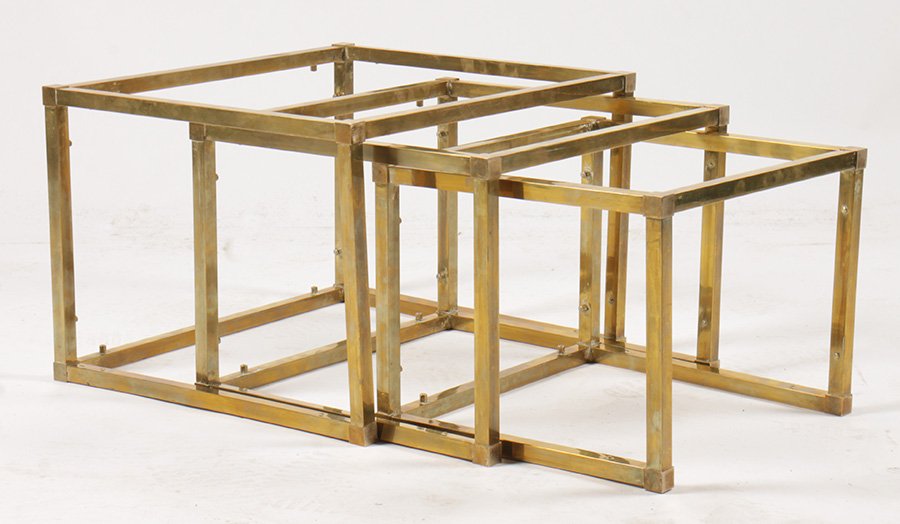 THREE MID CENTURY BRASS NESTING TABLES C.1960: A set of three mid century brass and glass nesting tables circa 1960. Ht: 18.75" Width: 20.5" Depth: 13.75"