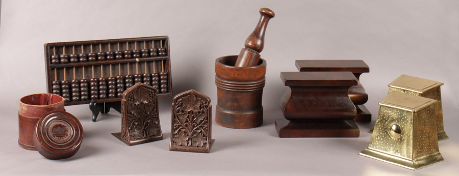 10 PC LOT GENTLEMANS OFFICE LOT ABACUS BOOKENDS: Handsome ten piece lot of late nineteenth century gentleman's office lot. Consisting of an antique abacus, two sets of wooden bookends, a set of unique brass canister bookends, a morter and pestle, an