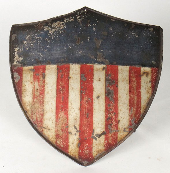 HANDMADE POLYCHROMED METAL AMERICAN SHIELD C.1930: A nice handmade and polychromed metal shield with American theme circa 1930. Ht: 12" Width: 12" Depth: 1"