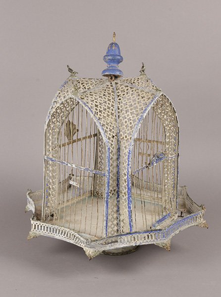 ANTIQUE MOORISH STYLE BIRD CAGE CIRCA 1920: A charming antique Moorish style bird cage circa 1920. Ht: 21" Dia: 18"