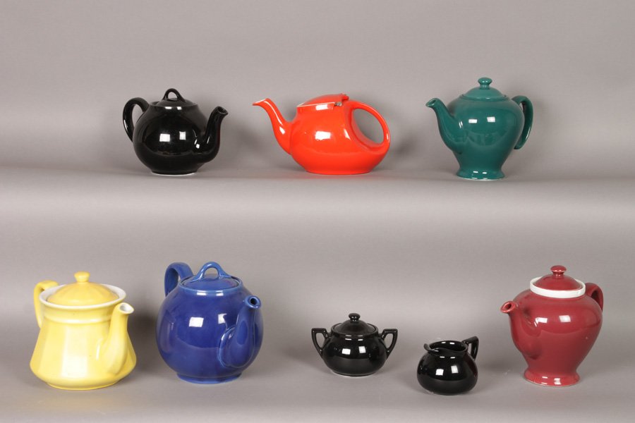 LOT MID CENTURY CHINA TEAPOTS HALL MCCORMICK: Handsome collection of mid century China Teapots. Consisting of 4 Hall pots, 2 McCormick pots, and a Lipton pot, cream and sugar. Ht: 7" (tallest)