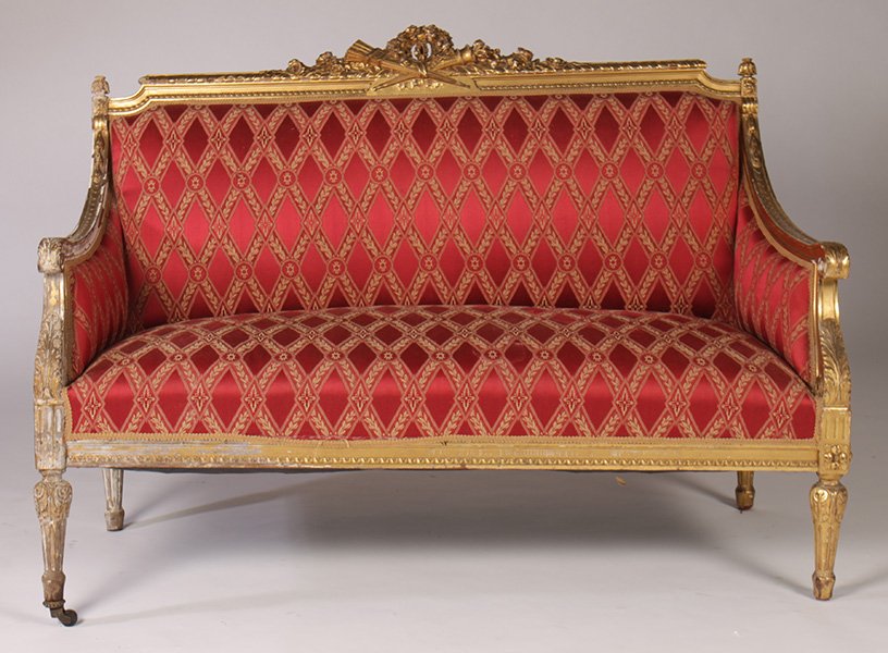 NEOCLASSICAL STYLE GILTWOOD SETTEE C.1900: A giltwood settee in neoclassical taste having burgundy silk upholstery circa 1900. Ht: 38.5" Width: 53" Depth: 31"