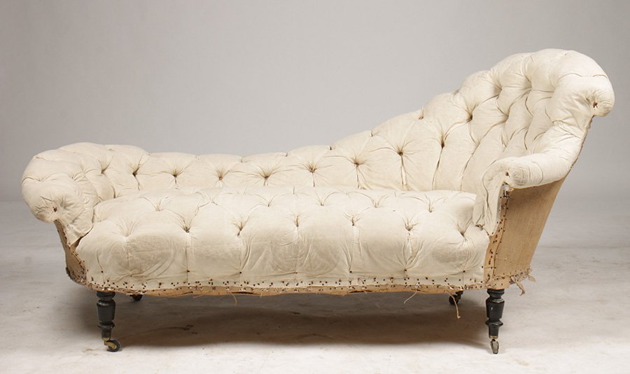 SHAPELY NAPOLEON III CHAISE LOUNGE UPHOLSTERED: A very sexy and shapely Napoleon III chaise lounge with button tufted upholstery circa 1880. Ht: 35" Width: 73.5" Depth: 29"