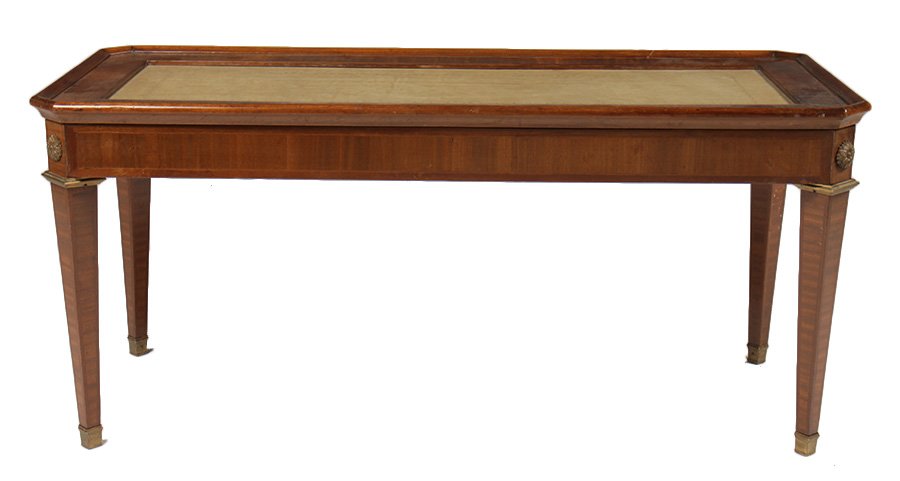 RECTANGULAR BRONZE MOUNT LEATHER TOP COFFEE TABLE: A rectangular bronze mounted and leather top coffee table circa 1940. Dimensions: Ht: 41" Width: 18.5" Depth: 17.5"