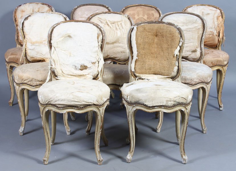 SET 9 LOUIS XV STYLE GILTWOOD DINING CHAIRS: Set of nine Louis XV style carved and giltwood dining chairs having shaped backs and seats with nailhead decoration on carved legs circa 1940. Ht: 34" Width: 18" Depth: 17.5"