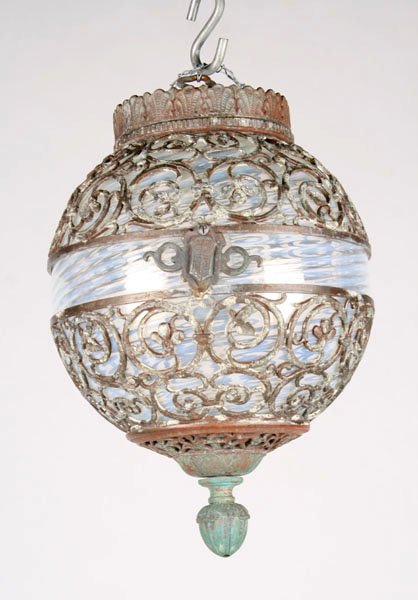 OSCAR BACH ATTRIB BLOWN SWIRL GLASS GLOBE 1890: An Oscar Bach attributed blown swirl glass globe having ornate metal decoration and acorn style finial circa 1890. Ht: 14" Dia: 10"